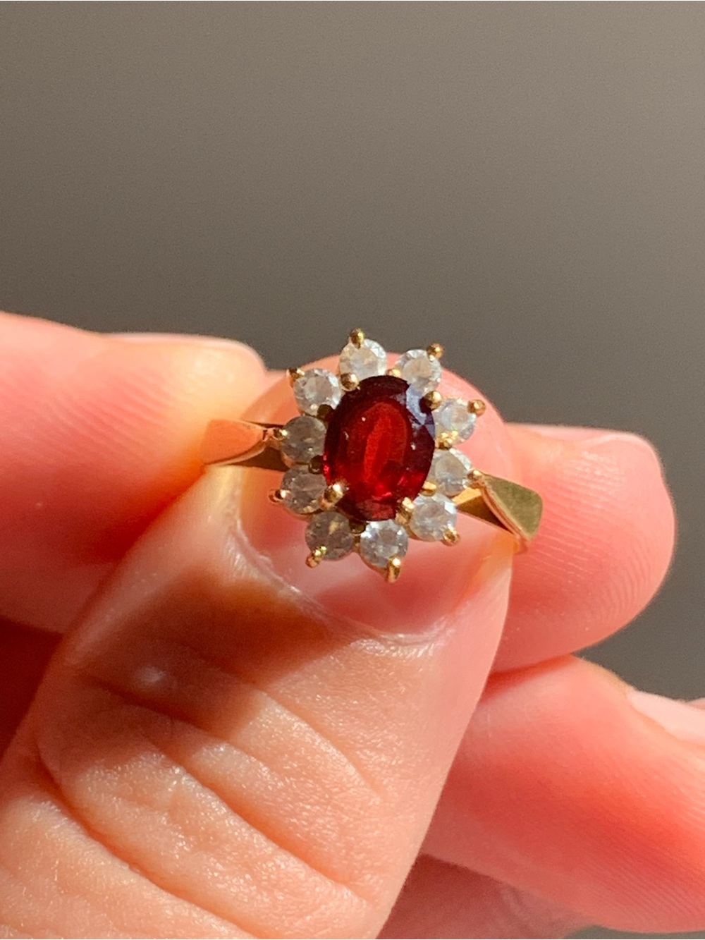 22 karat Gold Red Garnet Halo Ring